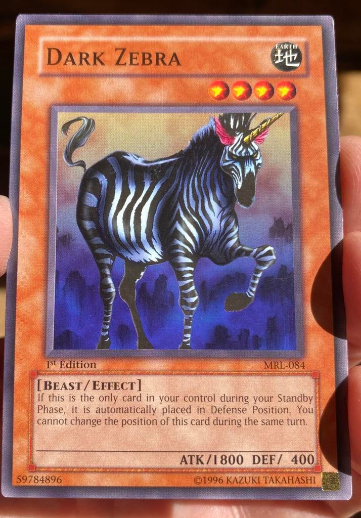 Yu-Gi-Oh! Dark Zebra MRL 1st Edition Old US Print !, Ophalen of Verzenden, Zo goed als nieuw, Losse kaart