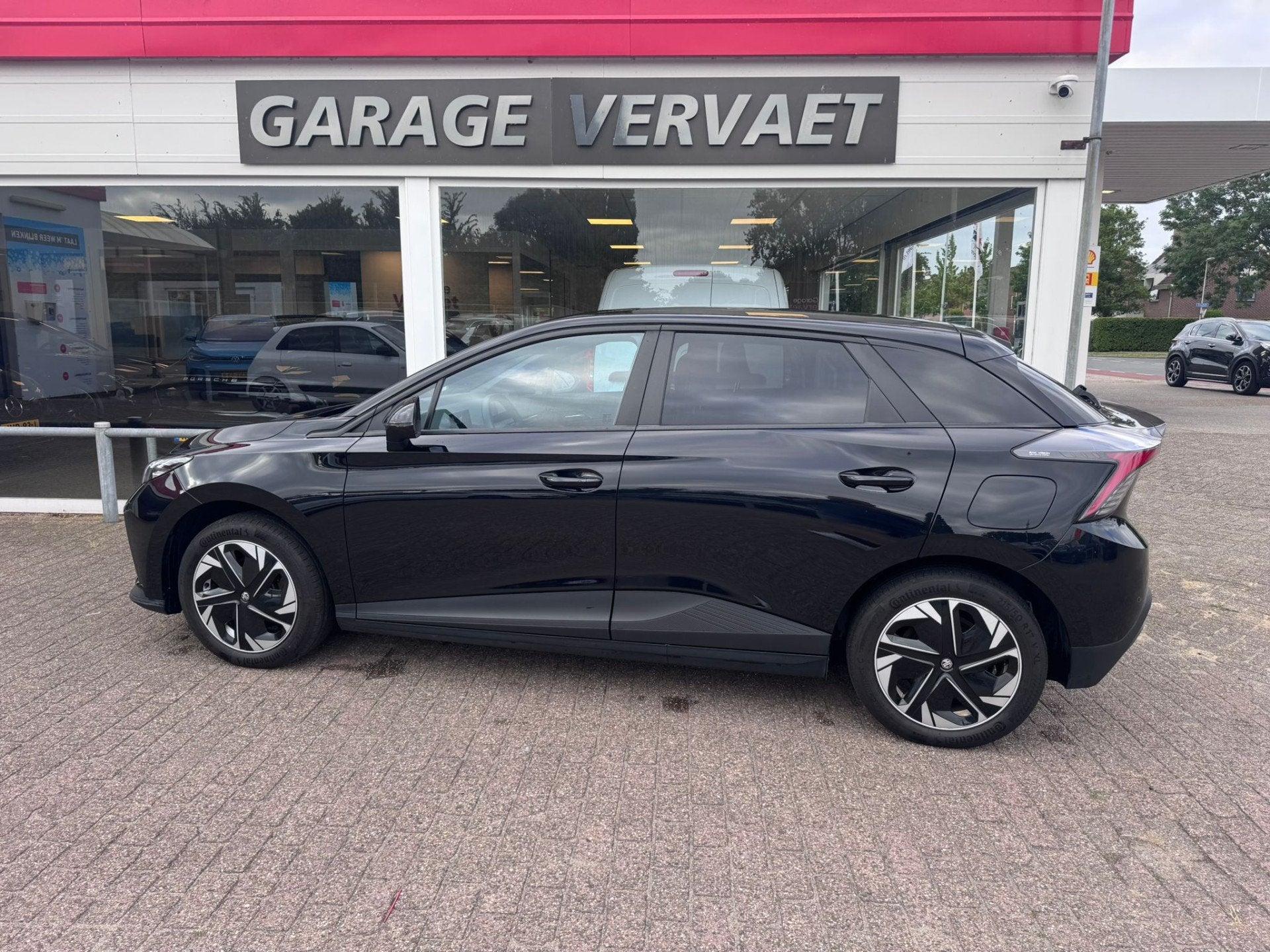 MG MG4 Electric Comfort 64 kWh, Auto's, Automaat, Parkeersensor, Stof, Zwart