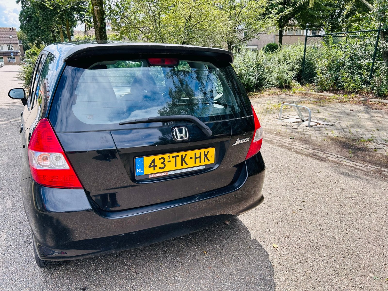 Honda Jazz 1.2 I 2006 Zwart, Auto's, Voorwielaandrijving, 450 kg, 40 €/maand, 4 cilinders