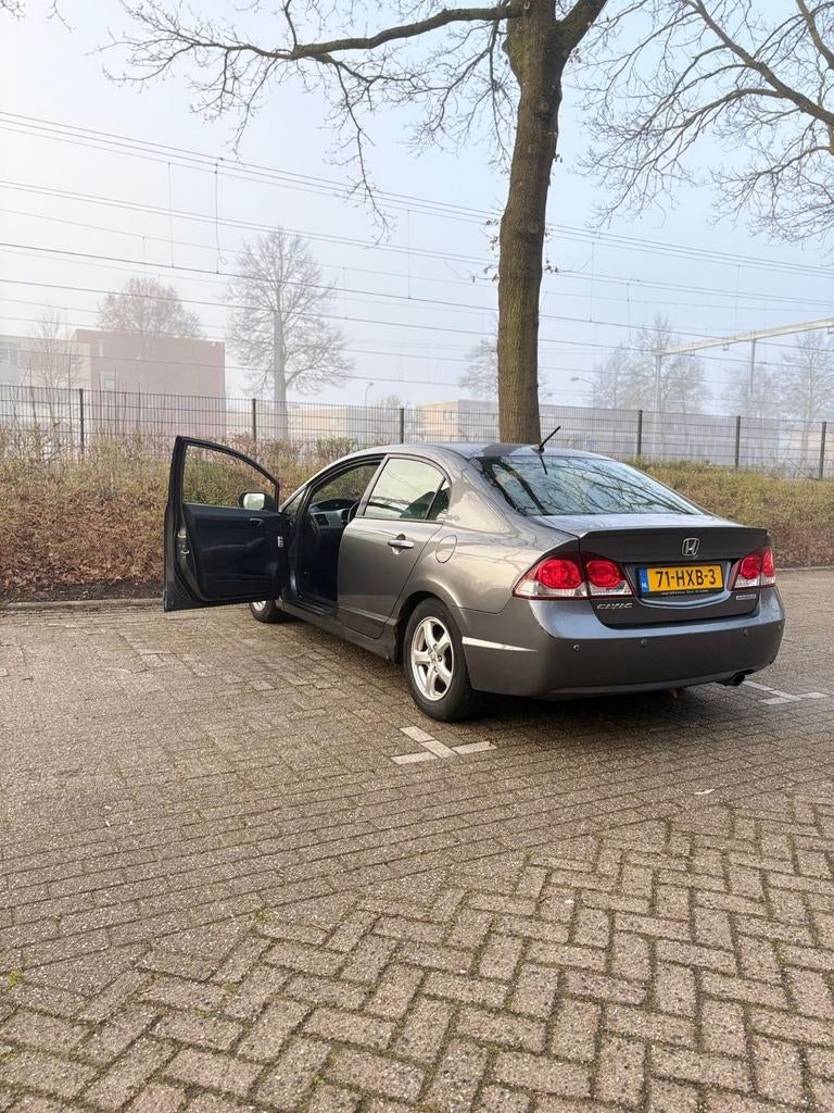 Honda Civic 1.3 Vtec Hybrid 4DR C-tr. 2009 Grijs, Origineel Nederlands, Grijs, 22 km/l, Sedan