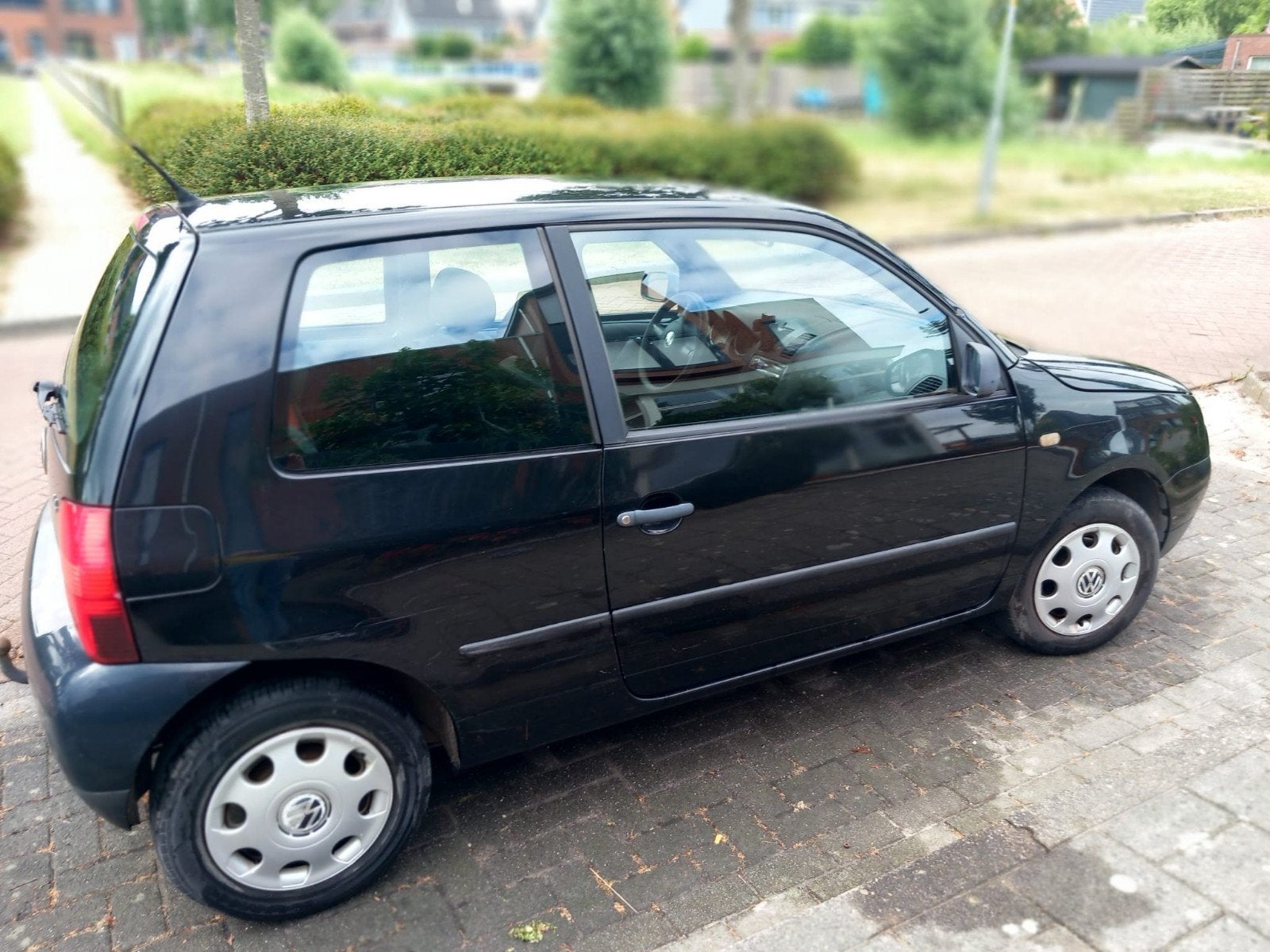 Volkswagen Lupo 1.4 55KW 1999 Zwart, Auto's, Volkswagen, Voorwielaandrijving, 450 kg, 74 pk, 31 €/maand