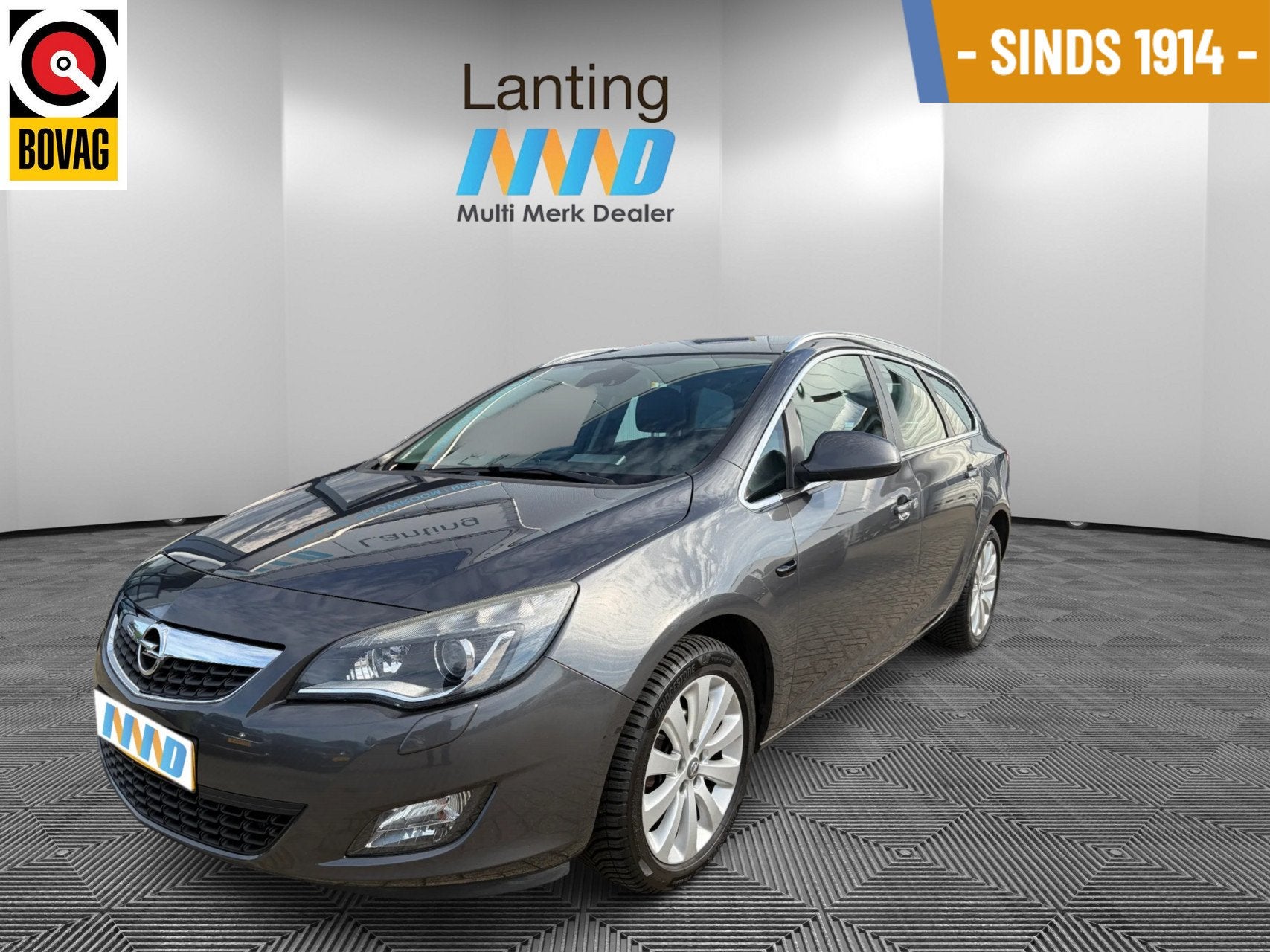 Opel Astra Sports Tourer 1.4 Turbo Cosmo airco cruise, Voorwielaandrijving, Euro 5, Gebruikt, 4 cilinders