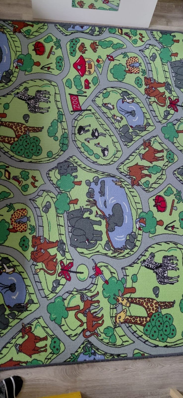 Vloerkleed dierentuin, Ophalen