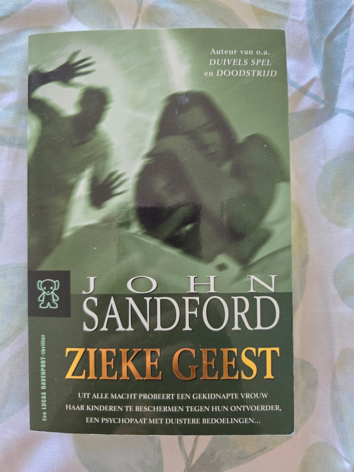 John Sandford - Zieke geest, Gelezen, Ophalen of Verzenden, Nederland, John Sandford