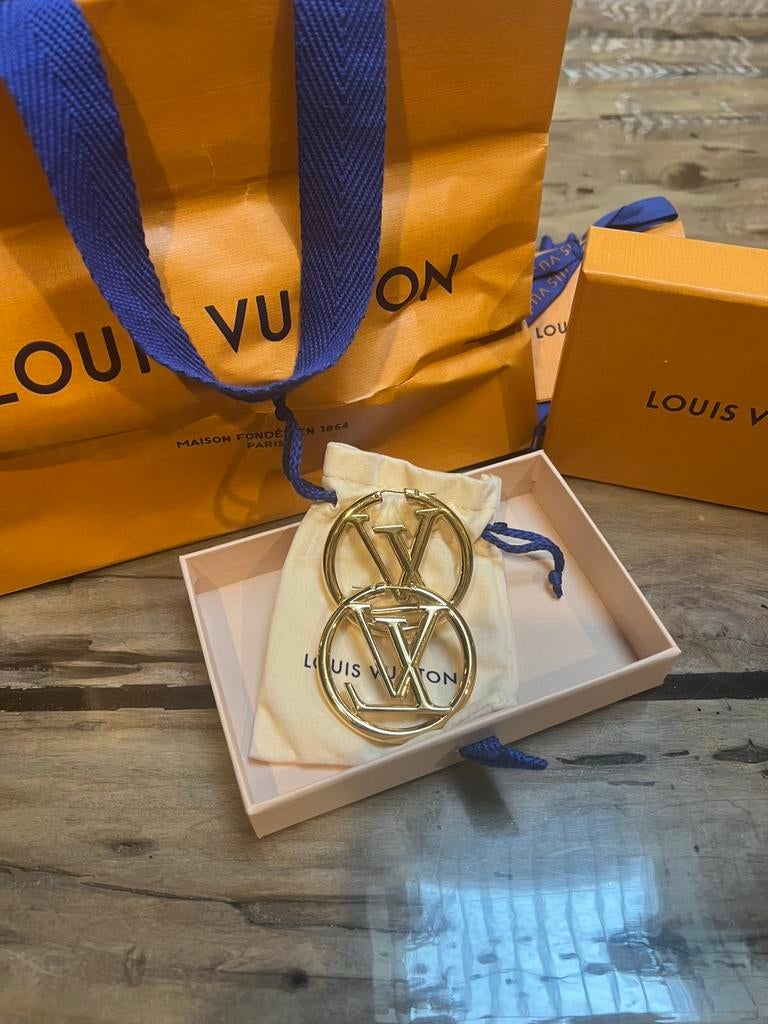 Lv oorbellen, Ophalen of Verzenden, Gebruikt, Goud, Overige materialen