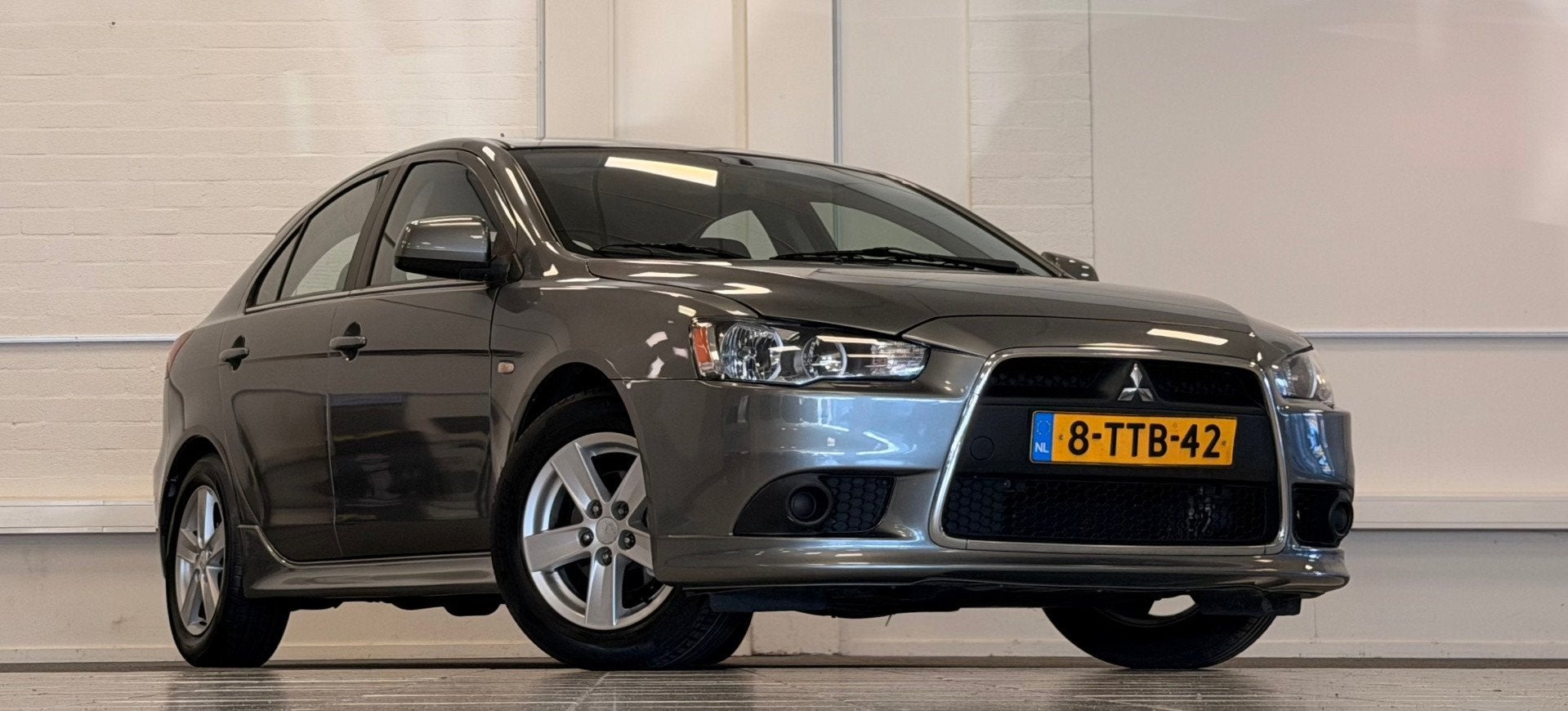 Mitsubishi Lancer Sportback 1.6 Limited Edition Nieuw staat, Auto's, Voorwielaandrijving, Euro 5, Stof, Gebruikt