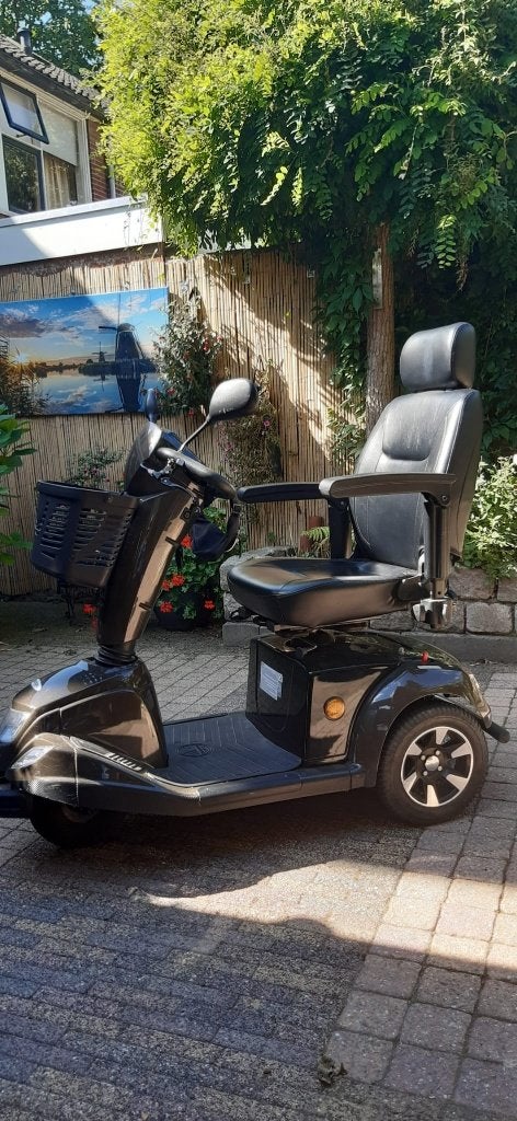Scootmobiel Leopard 3 / weinig km's/ 2015 / nieuwe accu's, Ophalen, Zo goed als nieuw, Mango, 16 km/u of meer