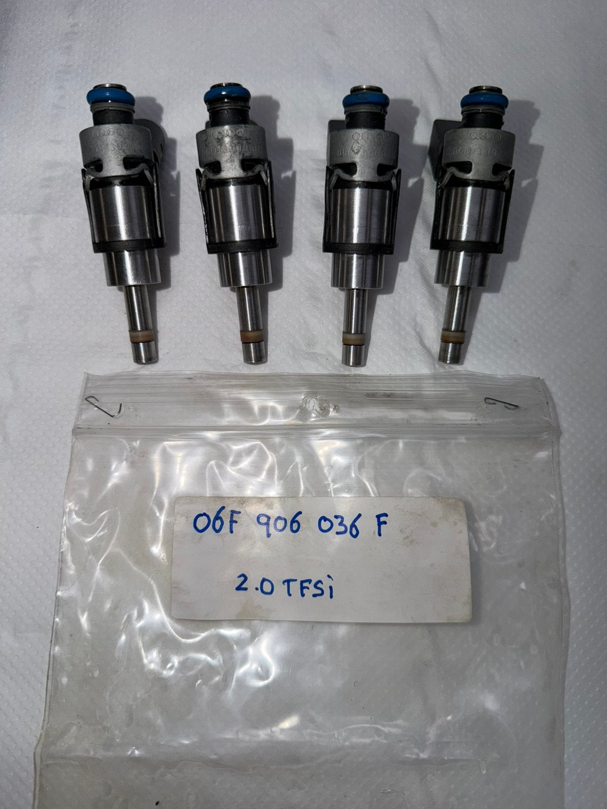 4x originele 2.0 TFSI K04 injectoren 06F 906 036 F, Ophalen of Verzenden, Gebruikt, Volkswagen