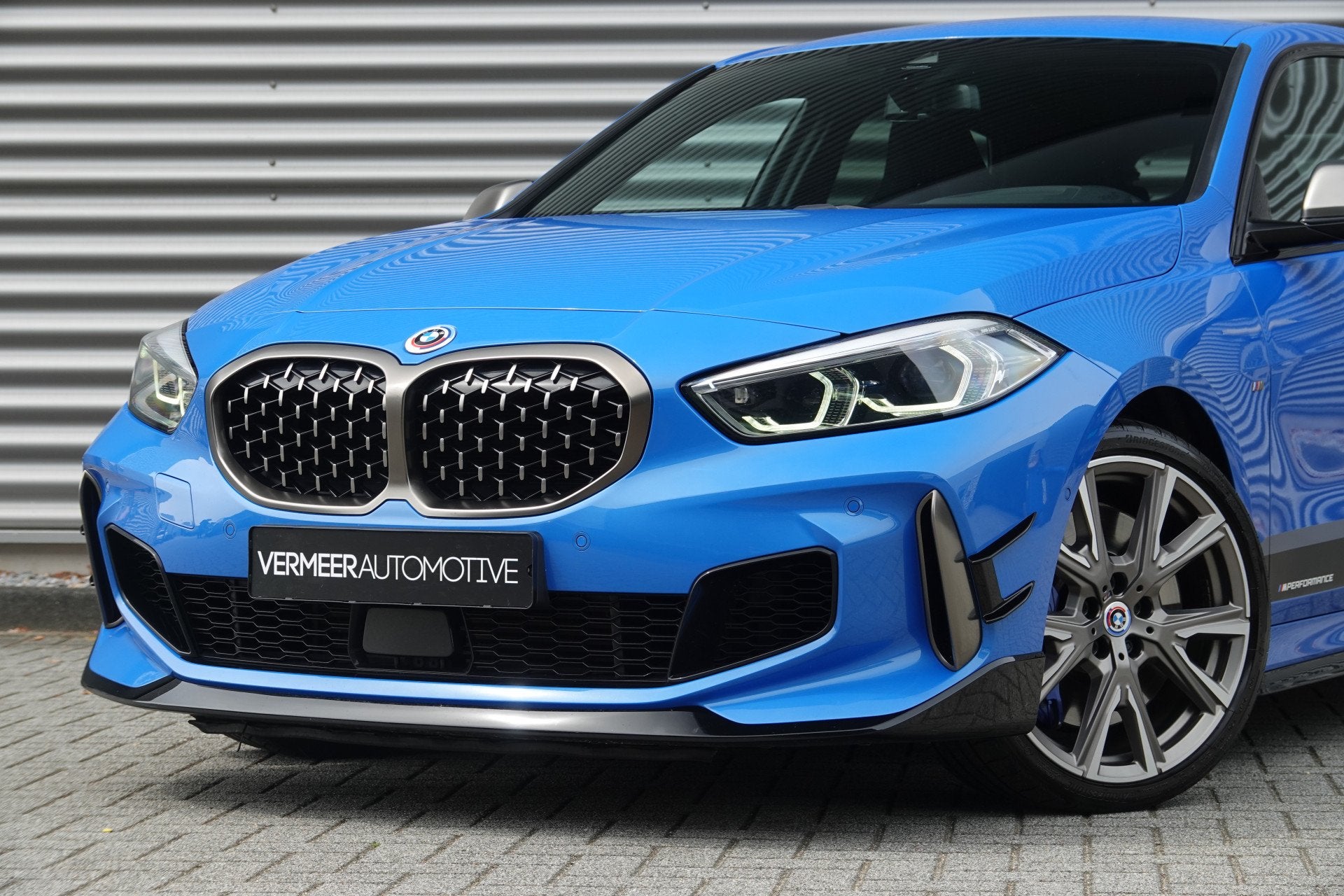 BMW 1-serie M135i xDrive High Executive | M Performance | HU, Auto's, Gebruikt, 4 cilinders, Blauw, Alcantara