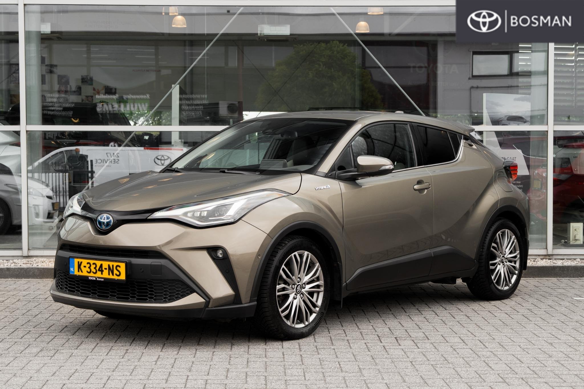 Toyota C-HR 2.0 Hybrid Executive Trekhaak, Automatische klimaatregeling, Euro 6, 4 cilinders, Bruin