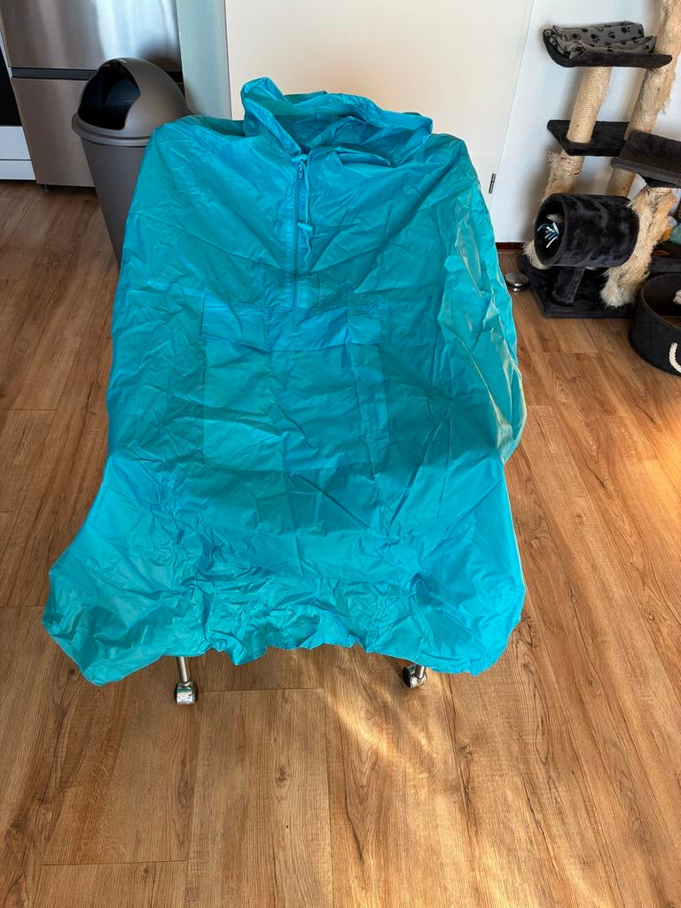 Handige opvouwbare poncho in reistas - Blauw, Ophalen of Verzenden, Zo goed als nieuw, Regenpak, Dames