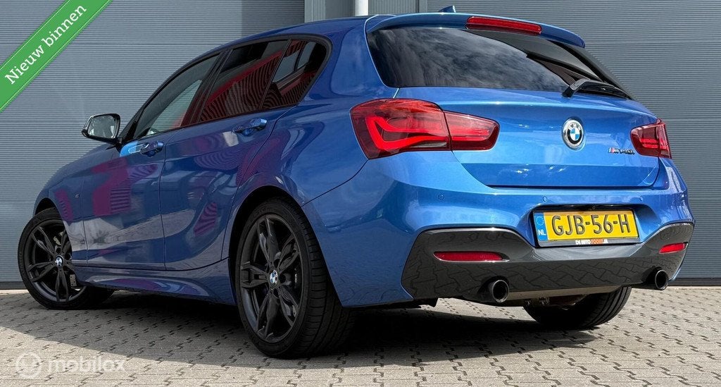 BMW 1-serie M140i xDrive LCI2 Edition Shadow Executive Navi+, Auto's, Gebruikt, Met garantie (alle), Blauw, 340 pk
