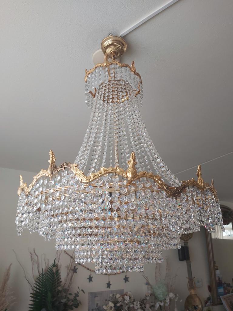 Een grote swarovski kristallen kroonluchter in goed staat, Ophalen of Verzenden