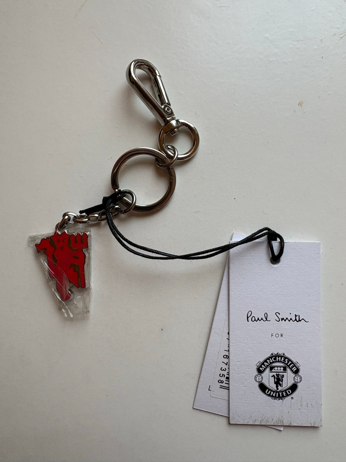 Paul Smith x Manchester United Sleutelhanger Nieuw, Verzamelen, Sleutelhangers, Ophalen of Verzenden, Nieuw, Merk