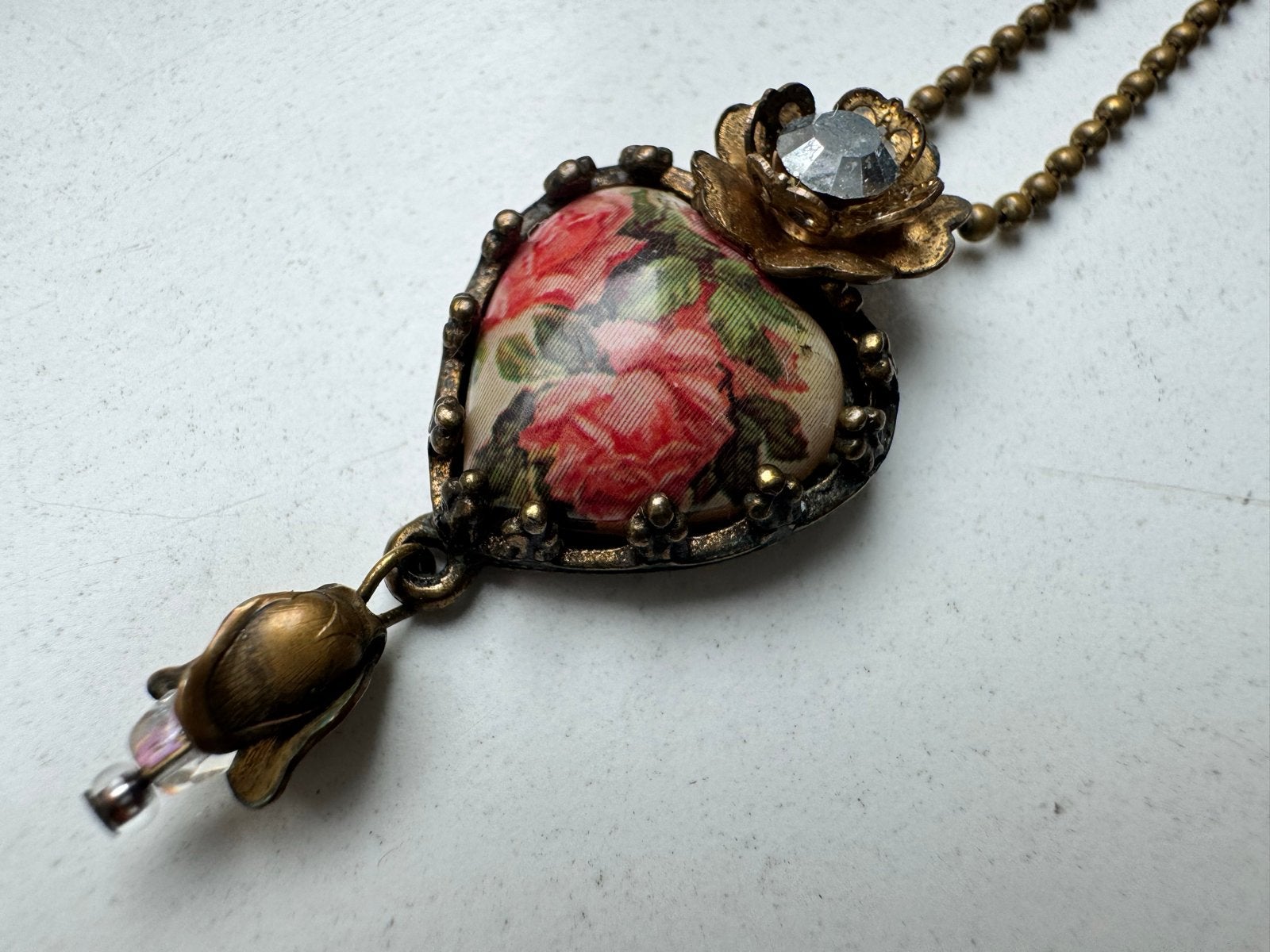 Michal Negrin ketting met hartvormige hanger en rozen, Met kristal, Overige materialen, Overige kleuren, Ophalen of Verzenden