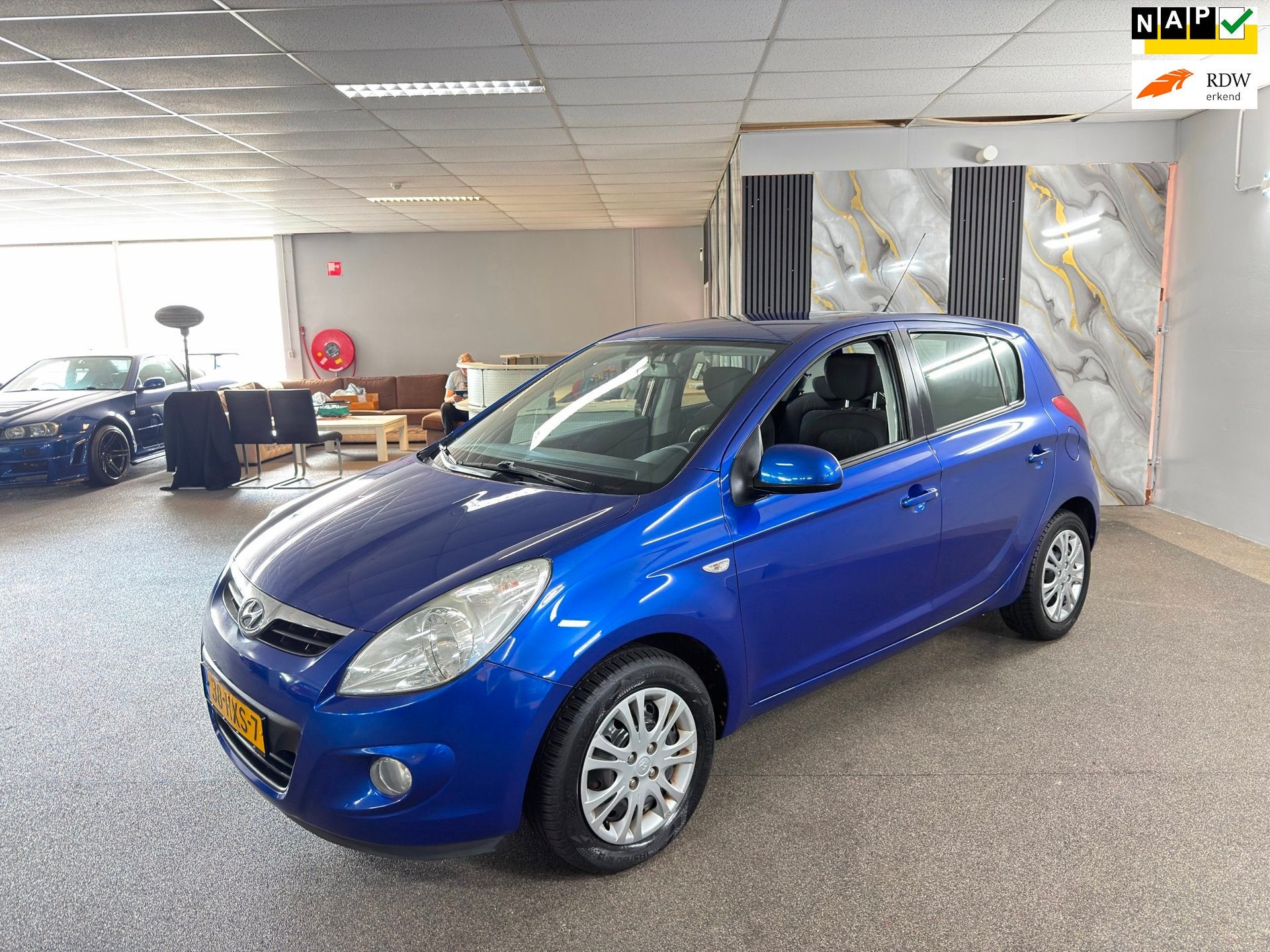 Hyundai I20 1.4i DynamicVersion 1e EigenaarDealer-onderhoude, Dealer onderhouden, Zwart, 4 cilinders, 1396 cc