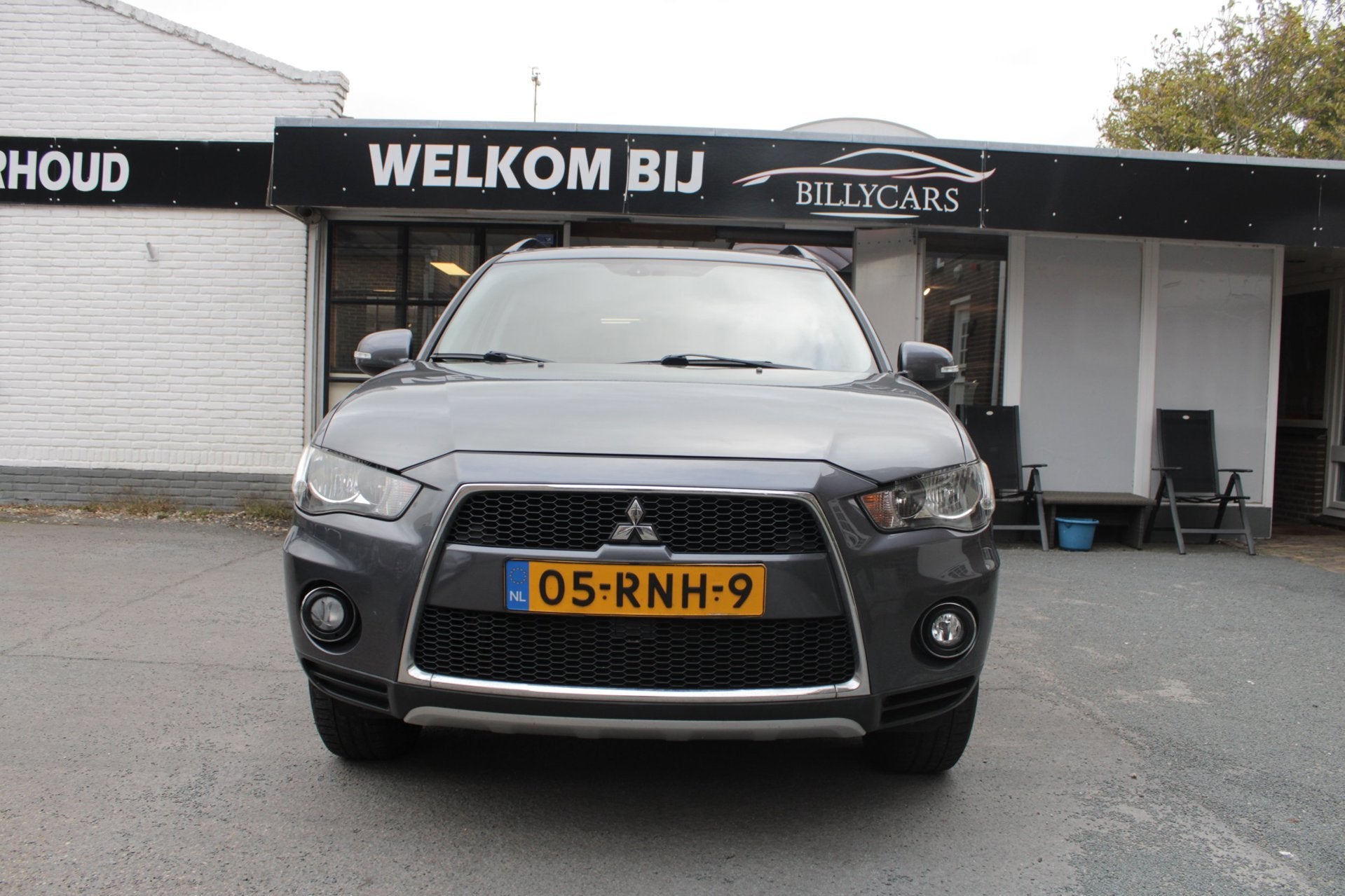 Mitsubishi Outlander 2.0 Intro Edition / AUTOMAAT / CruiseCo, Auto's, Zwart, 4 cilinders, Leder en Stof, Origineel Nederlands