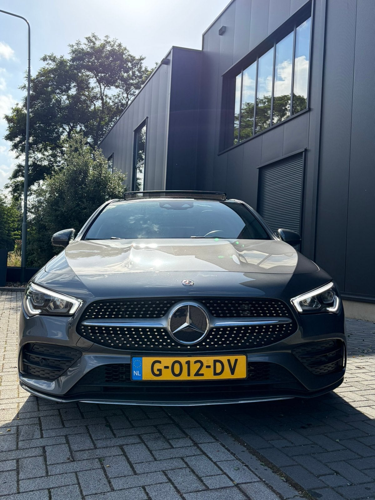 Mercedes-Benz CLA 200 shooting Brake AMG Line, Zwart, 4 cilinders, Leder en Stof, 163 pk