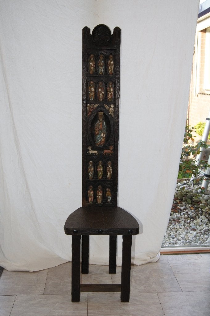 Antieke gesneden houten stoel met religieuze figuren, Ophalen of Verzenden