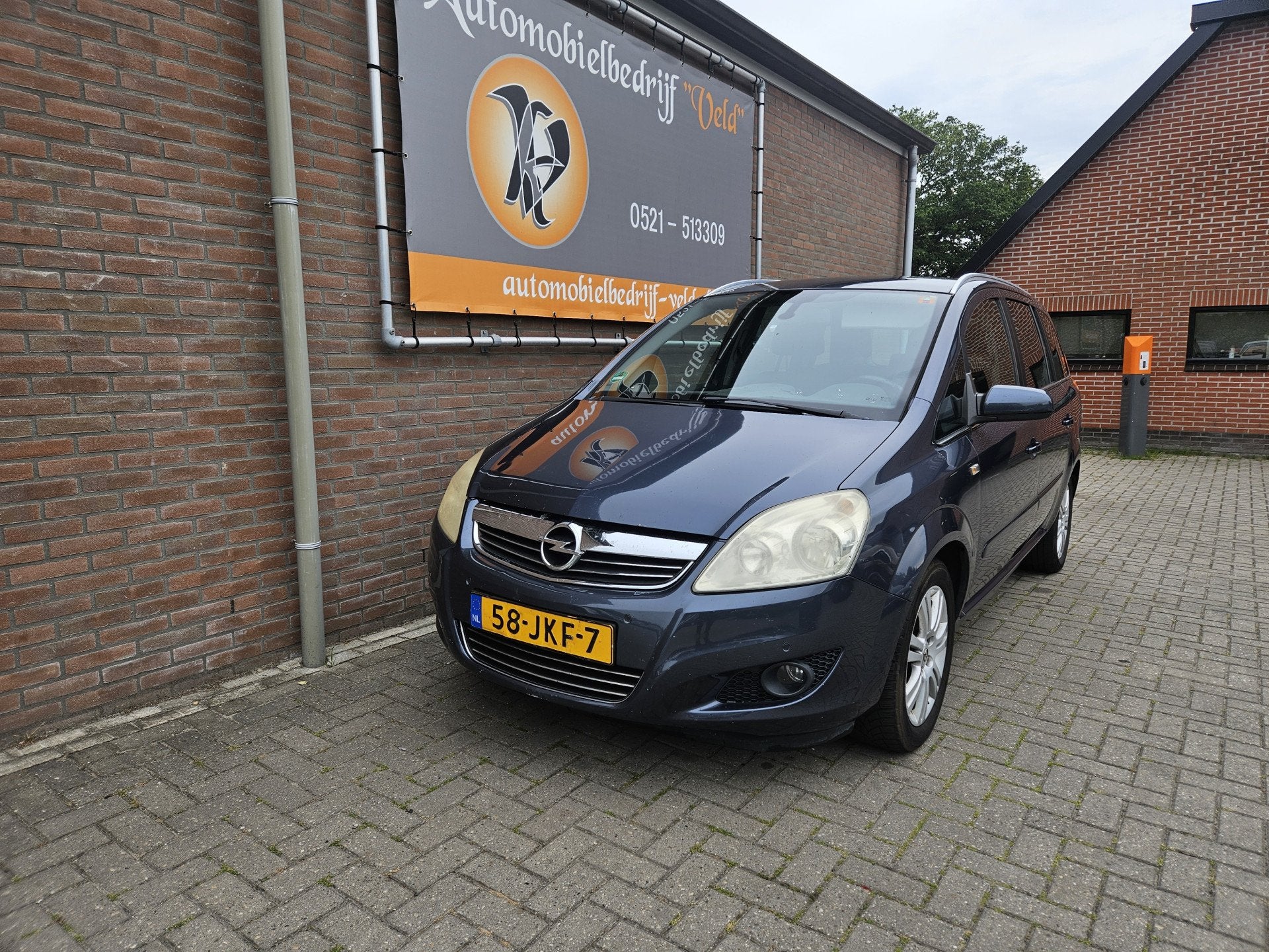 Opel Zafira 1.8 Cosmo (bj 2009), Auto's, Voorwielaandrijving, Gebruikt, Zwart, 4 cilinders