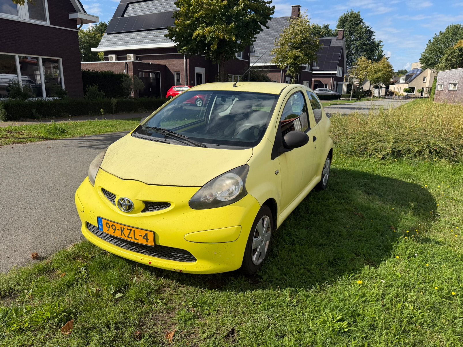 Toyota Aygo 1.0 12V Vvt-i 3DRS MMT 2010 geel, Auto's, Voorwielaandrijving, Stof, 4 stoelen, 68 pk