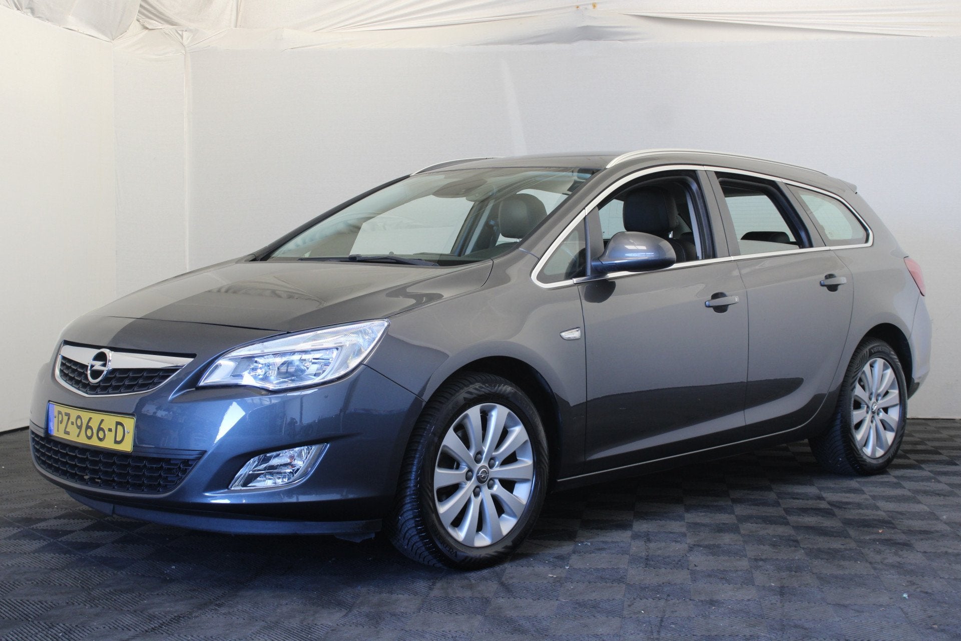 Opel Astra Sports Tourer 2.0 CDTi Cosmo (bj 2012, automaat), Auto's, Opel, Euro 5, Zwart, 4 cilinders, Leder en Stof
