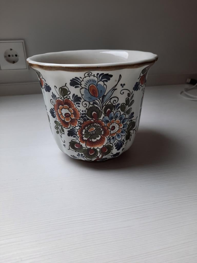 Delfts blauwe bloempot, Ophalen