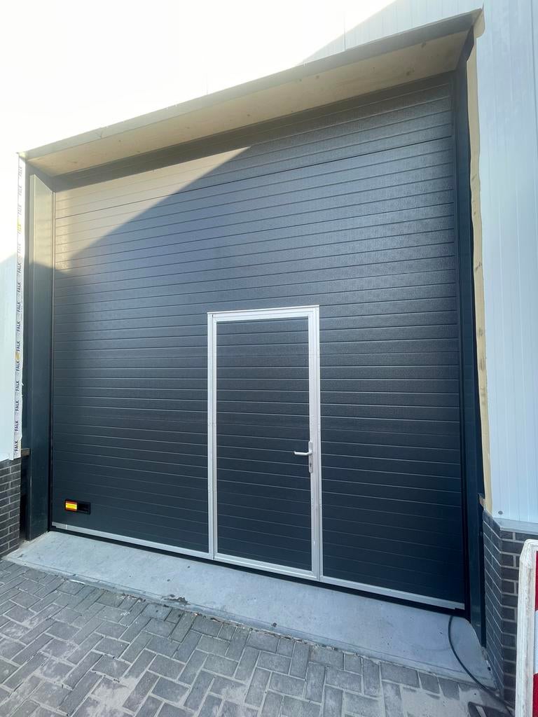 Alle maten nieuwe garagedeuren, roldeuren, bedrijfsdeuren NL, Doe-het-zelf en Verbouw, Ophalen of Verzenden, 120 cm of meer, 215 cm of meer