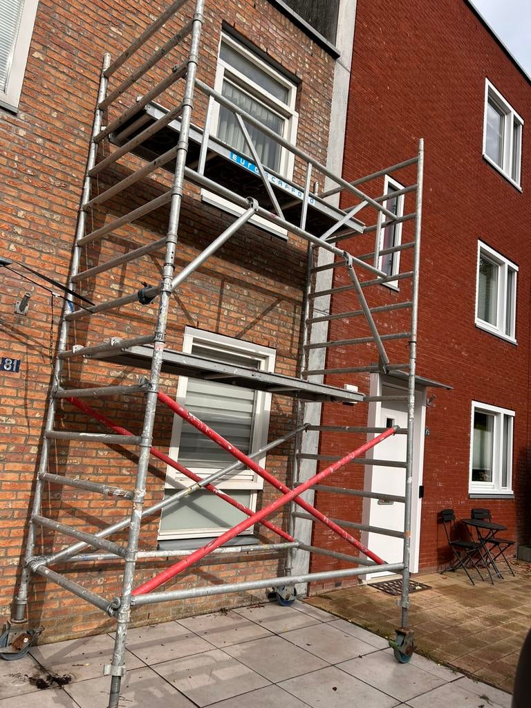Steiger verhuur Denhaag/Rotterdam, Doe-het-zelf en Verbouw, Steigers, Zo goed als nieuw, Rolsteiger of Kamersteiger, 5 meter of hoger
