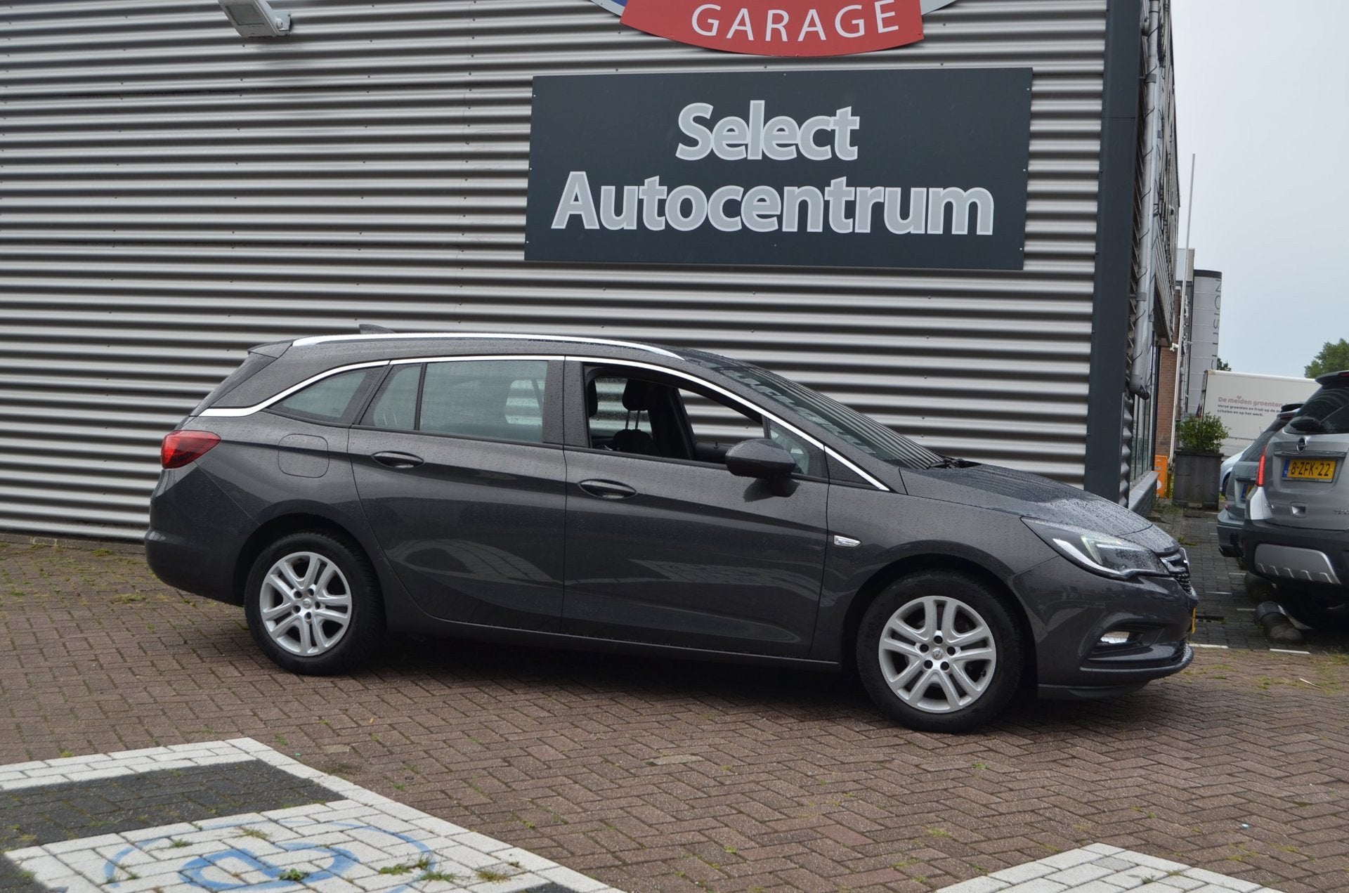 Opel Astra Sports Tourer 1.4 Edition|150PK|NAVI|TREKHAAK|SEN, Auto's, Dealer onderhouden, Gebruikt, 4 cilinders, 150 pk