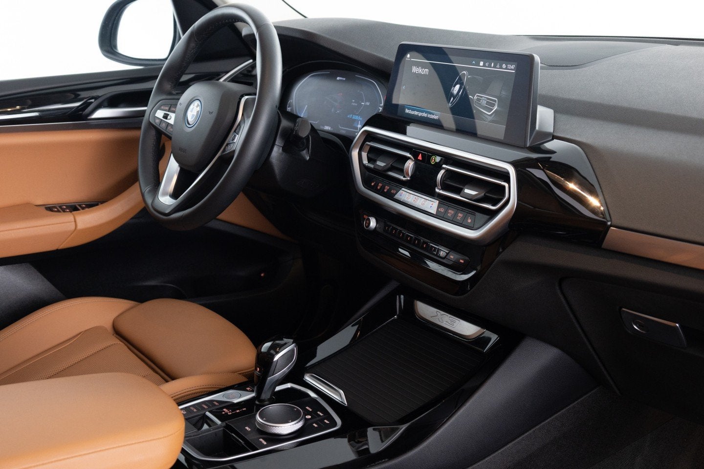 Foto 3 van BMW X3 xDrive30e High Executive | PANORAMADAK | LEDER | PHEV