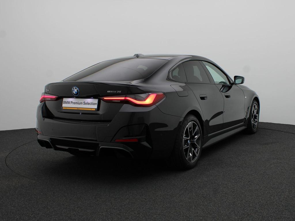 BMW i4 eDrive35 M Sportpakket | M Sport Edition | Innovation, Auto's, BMW, Adaptive Cruise Control, Zwart, Met garantie (alle)