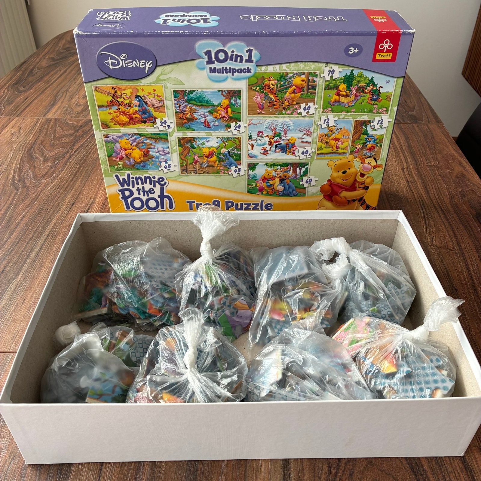 Winnie the Pooh puzzels ( 8 puzzels)+ verrassingspuzzel, Ophalen, Zo goed als nieuw