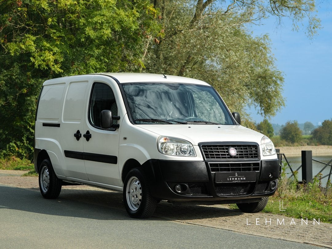 Fiat Doblò 1.3 Maxi (bj 2009), Auto's, Gebruikt, Wit, Origineel Nederlands, Bedrijf