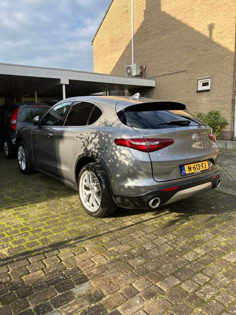 Alfa Romeo Stelvio 2.0 280pk AT AWD 2017 Grijs, Auto's, Alfa Romeo, Particulier, Stelvio, 4x4, ABS, Achteruitrijcamera, Adaptieve lichten