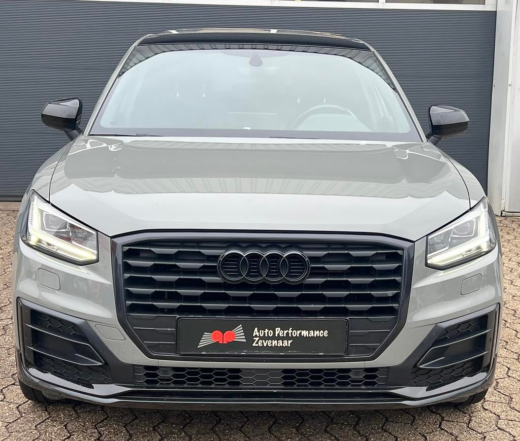Audi Q2 35 Tfsi 150pk S Tronic 2020 Grijs, Auto's, Audi, 15 km/l, 1498 cc, 4 cilinders, Leder en Stof