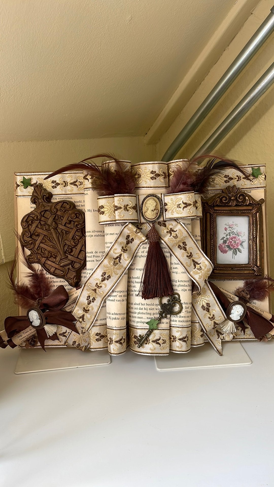 Mooi versierd decoratieboek, Ophalen