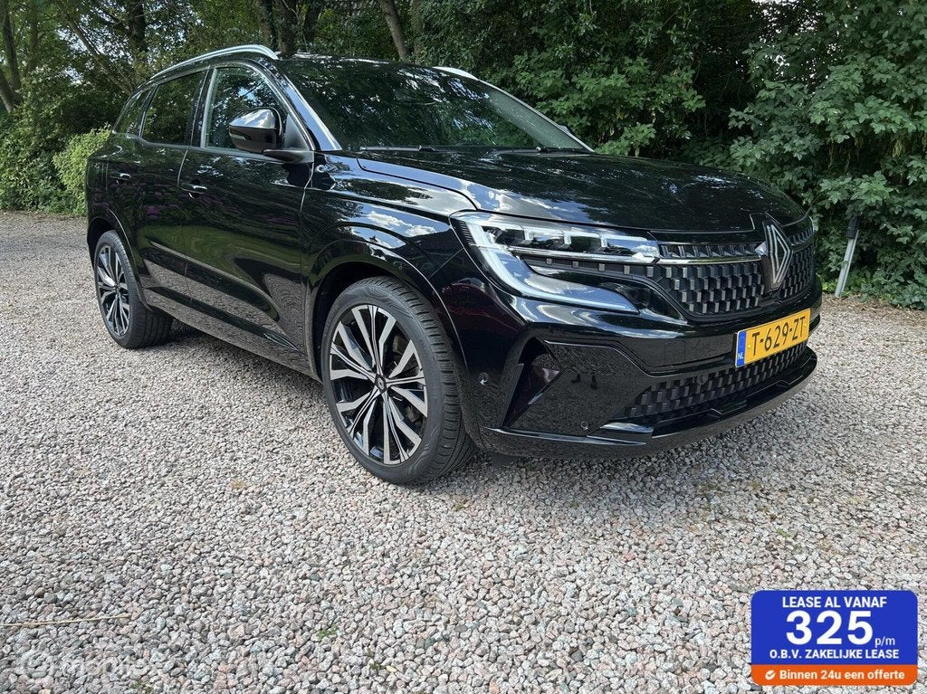 Renault Austral 1.2 E-Tech full hybrid 200 iconic trekhaak 1, Auto's, Renault, Gebruikt, 1199 cc, Leder en Stof, Zwart