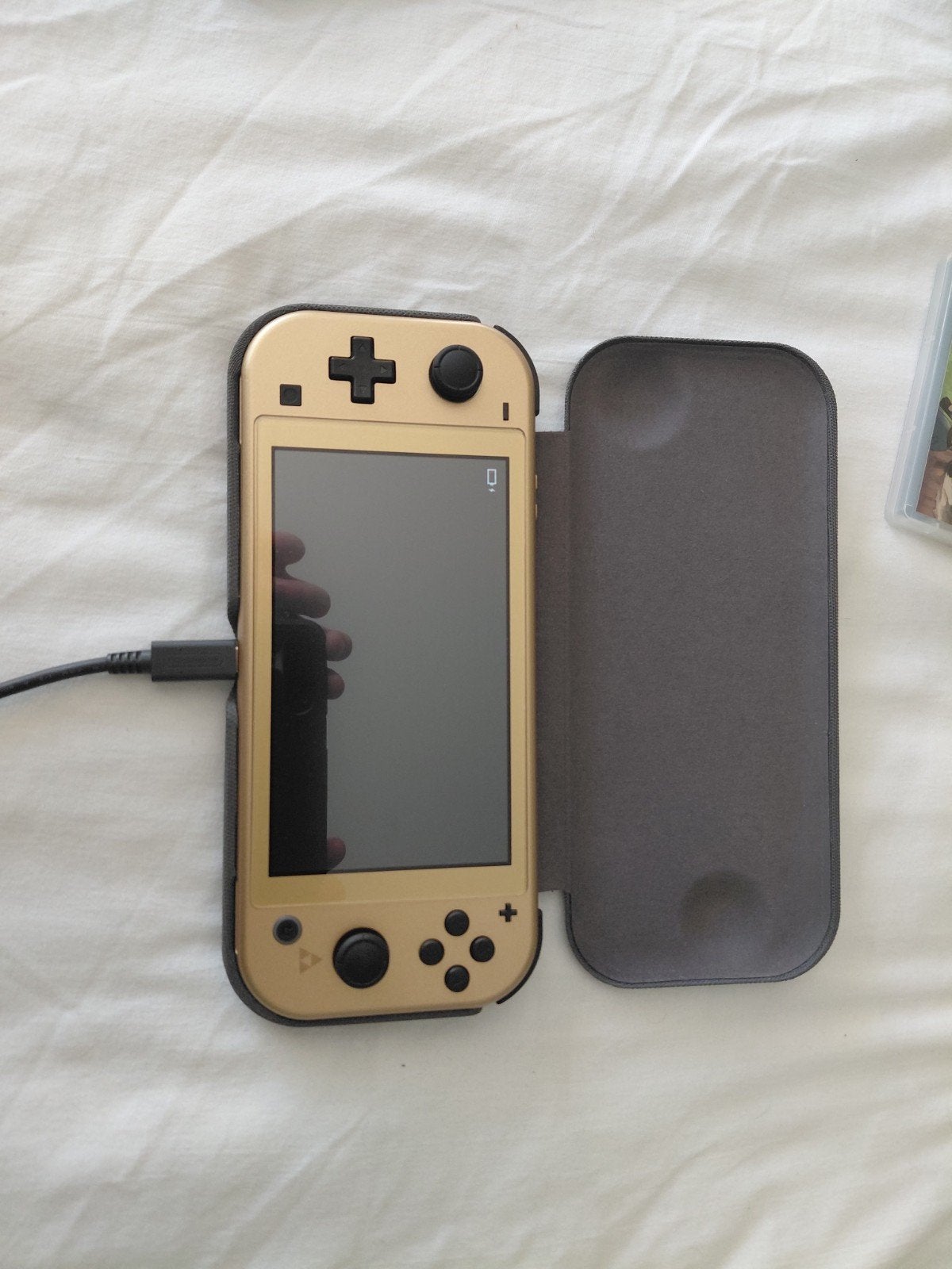 Switch Lite Hyrule Edition met cover case, Spelcomputers en Games, Ophalen of Verzenden, Overige kleuren, Zo goed als nieuw