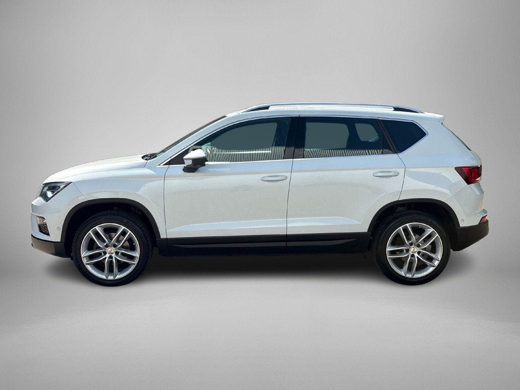 SEAT Ateca 1.5 TSI 4DRIVE FR Business Intense, Auto's, Seat, Automaat, 12 maanden, Automatische klimaatregeling, Wit