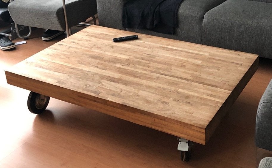 Robuuste salontafel op wielen - massief hout, Ophalen, Gebruikt, 100 tot 150 cm, 50 tot 100 cm