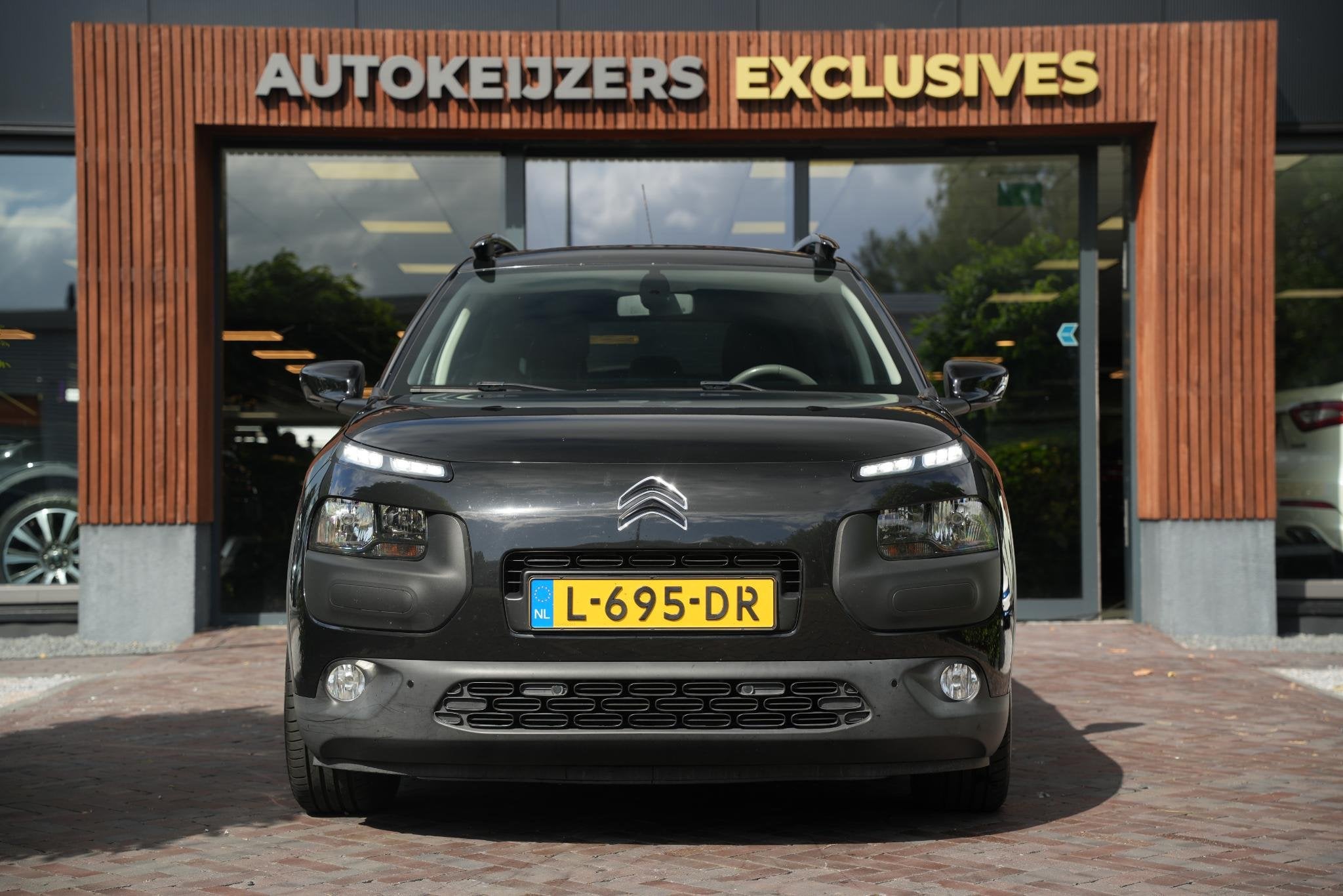 Citroen C4 Cactus 1.2 PureTech Business Plus, Voorwielaandrijving, Parkeersensor, Stof, Euro 6