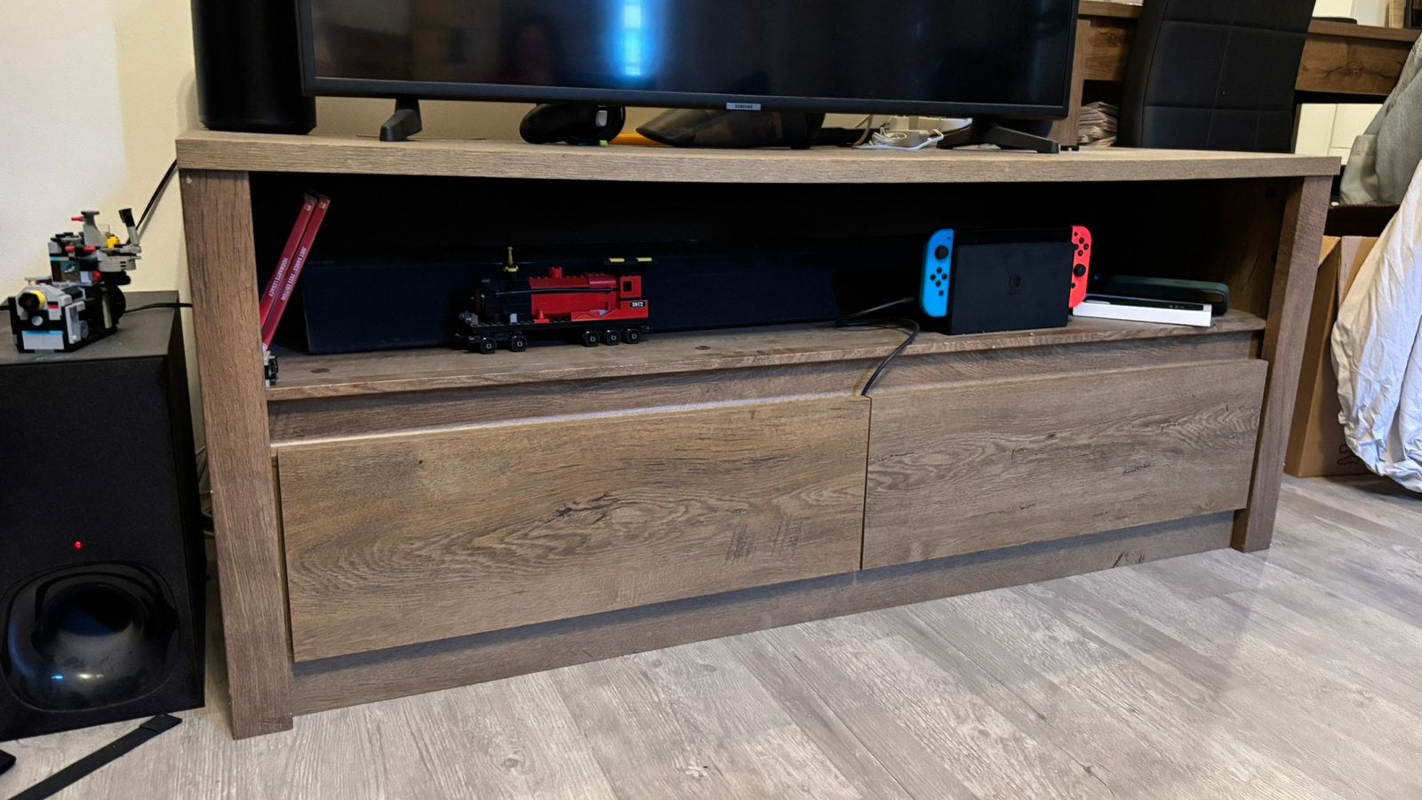 TV meubel Vedde | Donker Eiken | B130xD43xH53, Ophalen, Eikenhout, Gebruikt, 100 tot 150 cm