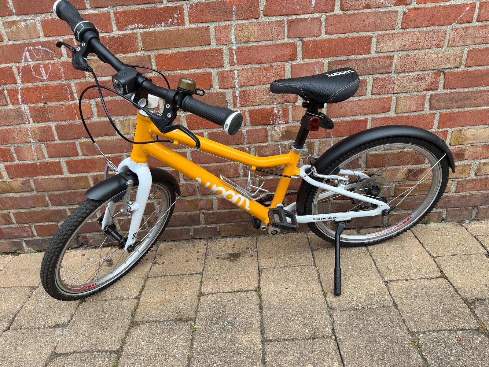 Woom 4 kinderfietsen - 20 inch - Oranje en Geel, Fietsen en Brommers, Ophalen, 20 inch of meer, Velgrem, Zo goed als nieuw
