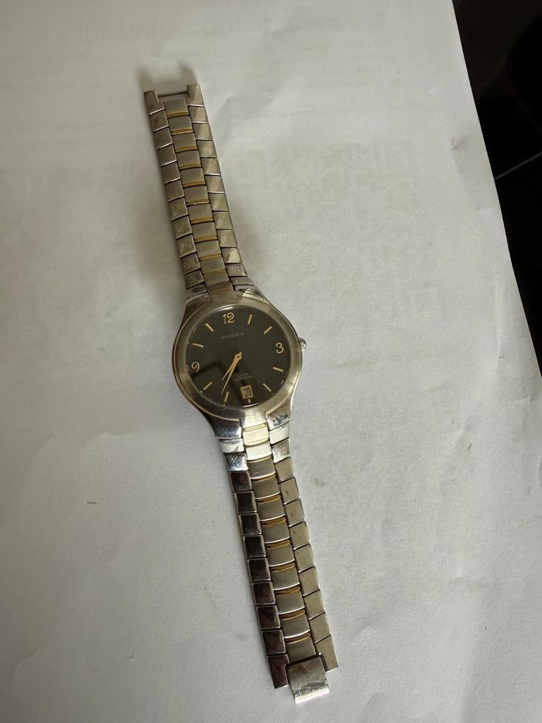 Prisma horloge met stalen band - Zo goed als nieuw, Ophalen of Verzenden, Zo goed als nieuw, Staal, Overige merken