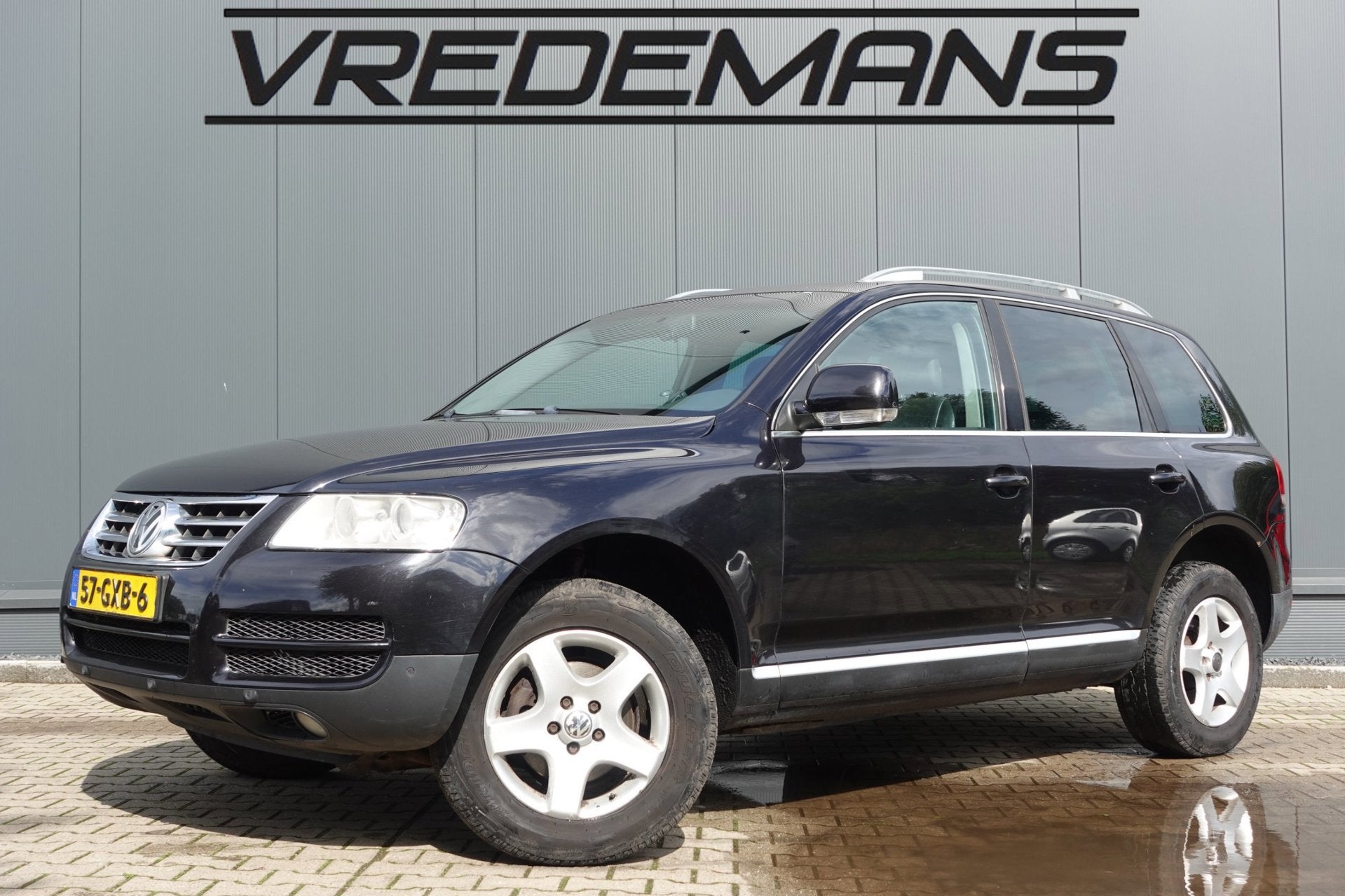 Volkswagen Touareg 2.5 TDI, Auto's, Gebruikt, Zwart, Bedrijf, Vierwielaandrijving