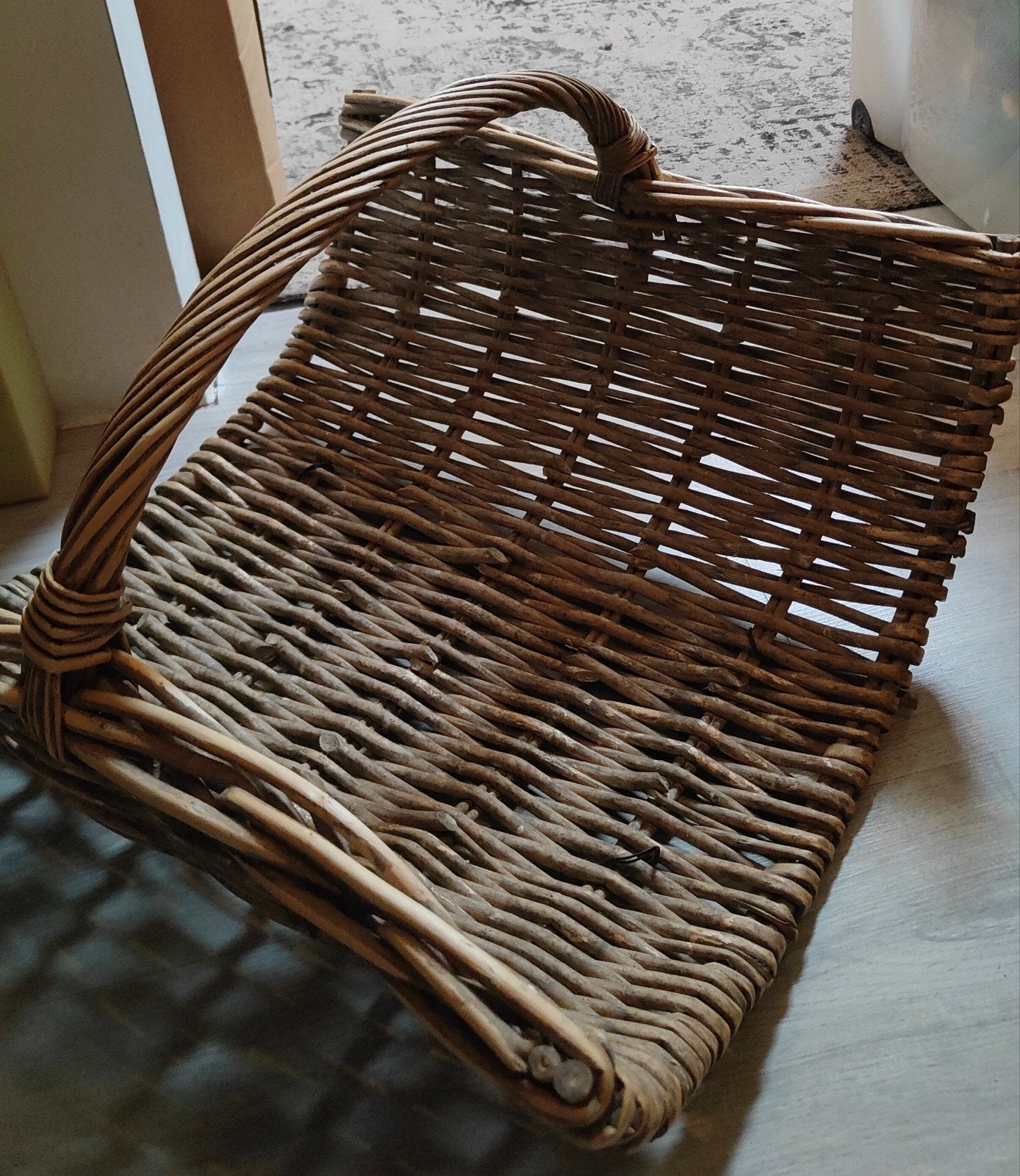 Rotan lectuurmand / tijdschriftenhouder, Ophalen