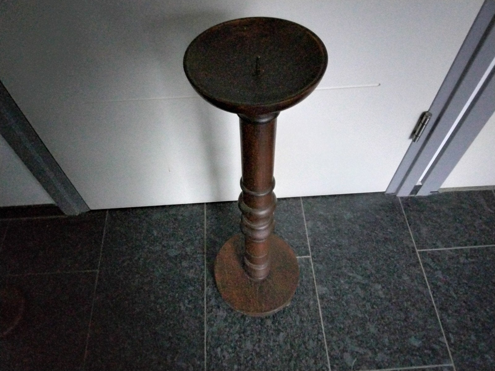 Antieke  kandelaar, Ophalen