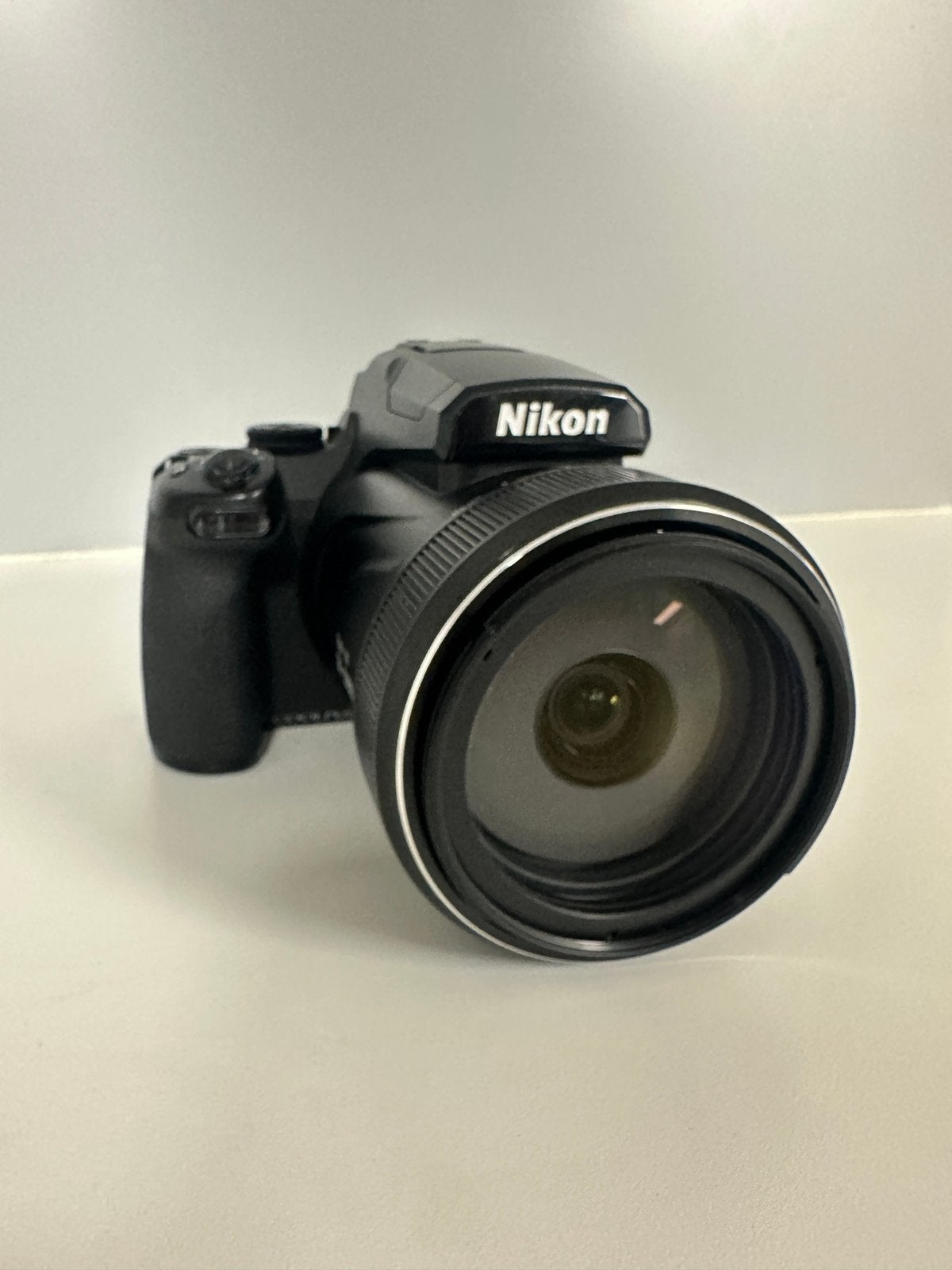 Nikon Coolpix P1000  | 4 Accu’s | Tas | Statief | 128GB, Audio, Tv en Foto, Ophalen, Compact, Zo goed als nieuw, 8 keer of meer