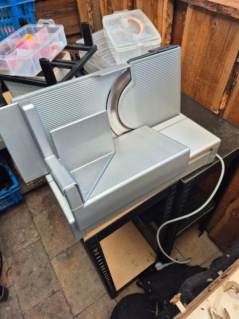 Vlees snij machine, Ophalen